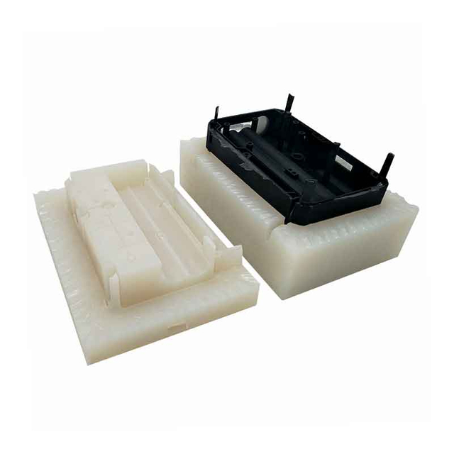 A bright red, glossy plastic car body panel with sleek, angular contours. Manufactured using Custom Plastic Vacuum Forming, the panel has several mounting holes and is isolated against a plain white background