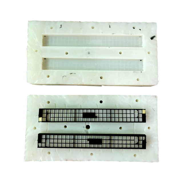A quality 3D model of a small vehicle cabin with an open front and side window spaces. The green, rectangular structure has a ridged roof, angular panels, and headlight indentations on the front. Utilizing custom plastic vacuum forming, this cost-effective cabin is designed for a compact utility vehicle
